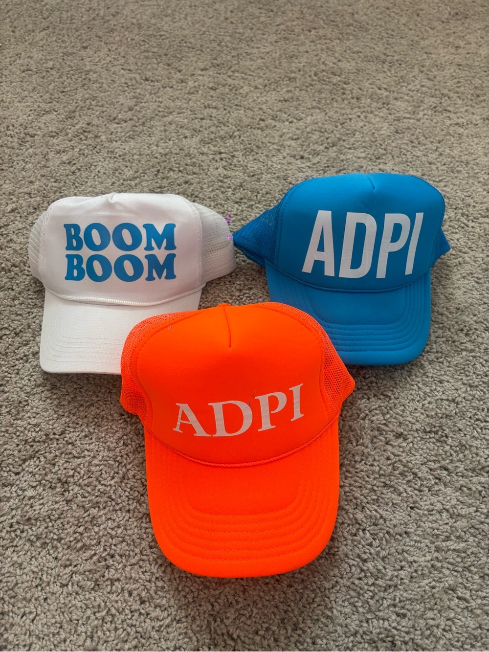ADPI & BOOM BOOM Trio of Graphic Trucker Hats - Orange, Blue, White